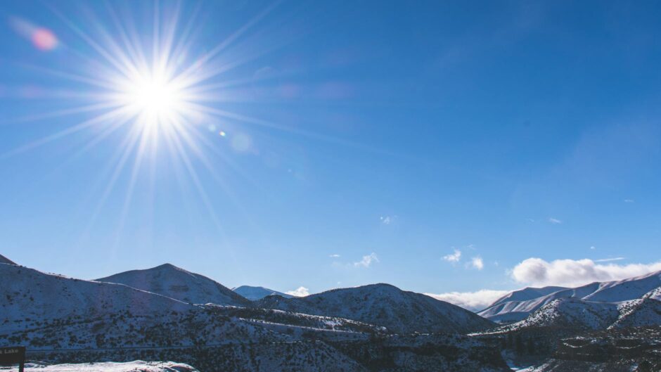snow capped mountain under blue sky