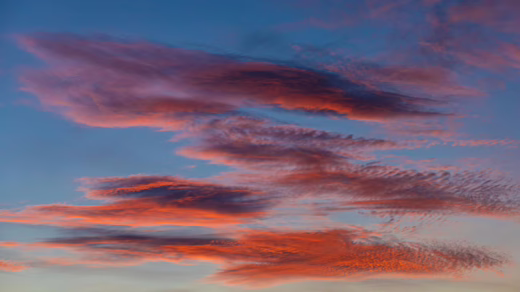 a beautiful blue sky of red clouds