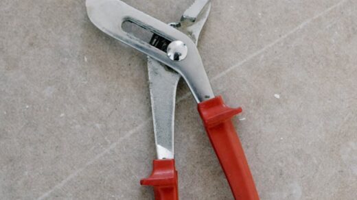 pliers for repair on stone floor
