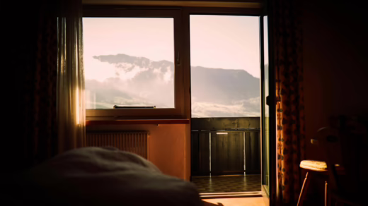 a room with view of mountains