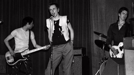 A photo of the Sex Pistols playing the Manchester Lesser Free Trade Hall on June 4th, 1976.