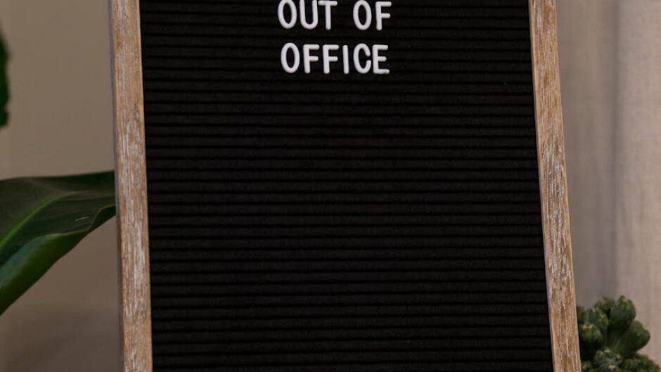 cozy office scene with out of office sign