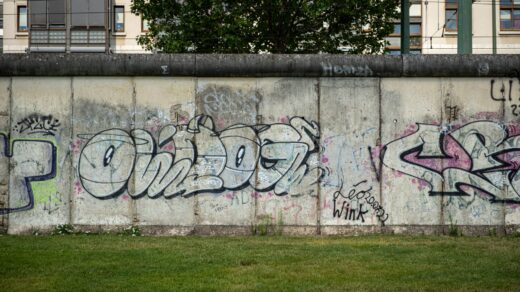 A grafitti-covered restored section of the Berlin Wall, at the Berlin Wall Memorial.