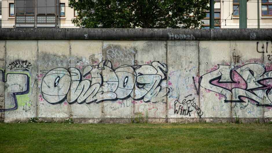 A grafitti-covered restored section of the Berlin Wall, at the Berlin Wall Memorial.